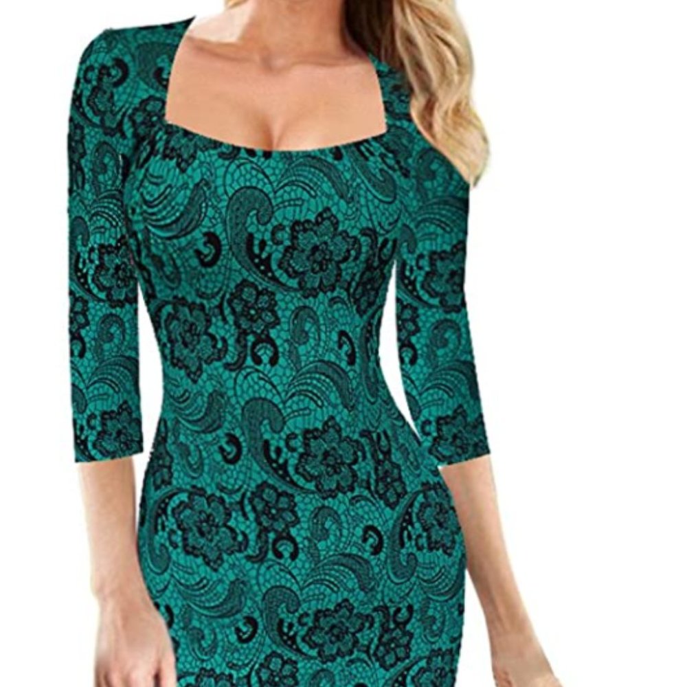 Beautiful, lined shape enhancing dress New without tags